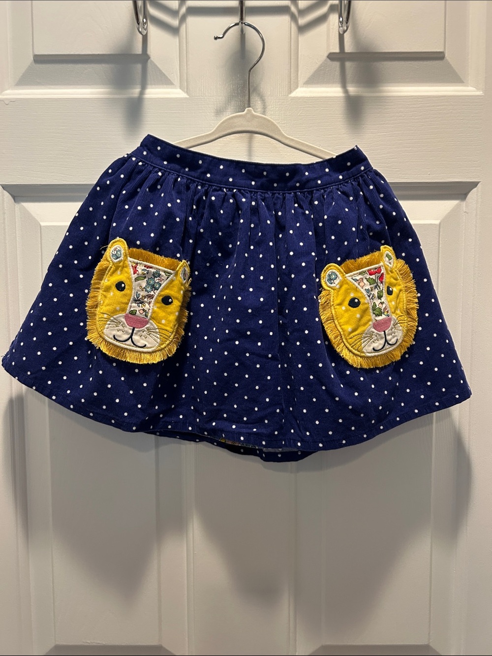 Mini Boden Navy Polka Dot Reversible Skirt with Yellow Lion Pockets